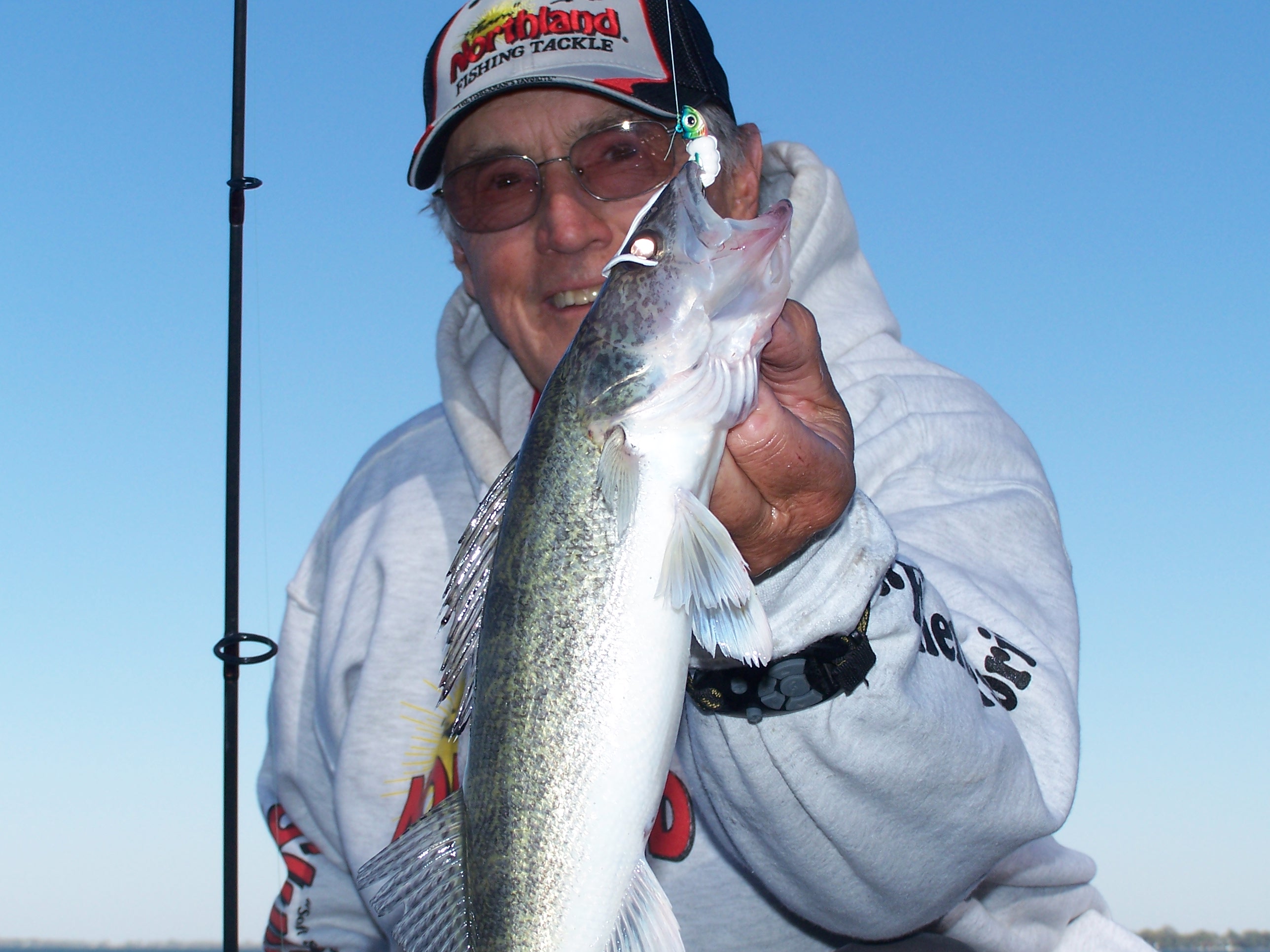 The Fishing Professor Jim McDonnell with a West Lake Okoboji walleye