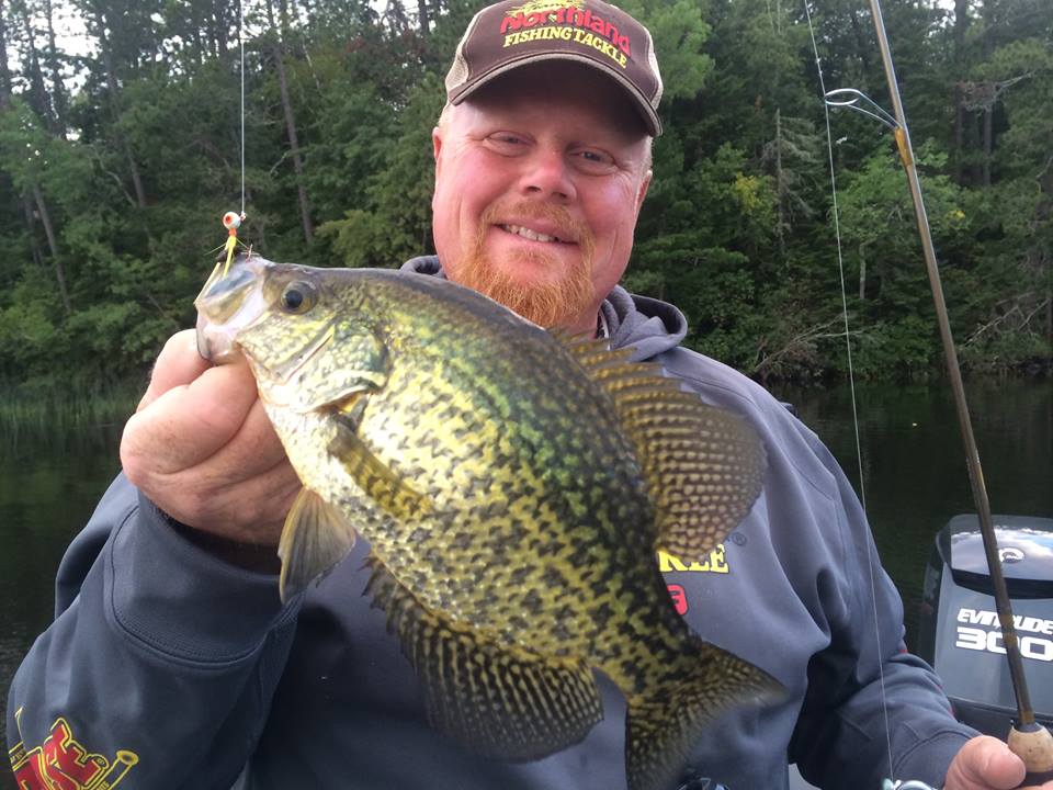 Brian 'Bro' Brosdahl holding up a big summer crappie he caught on a Northland Fishing Tackle jig
