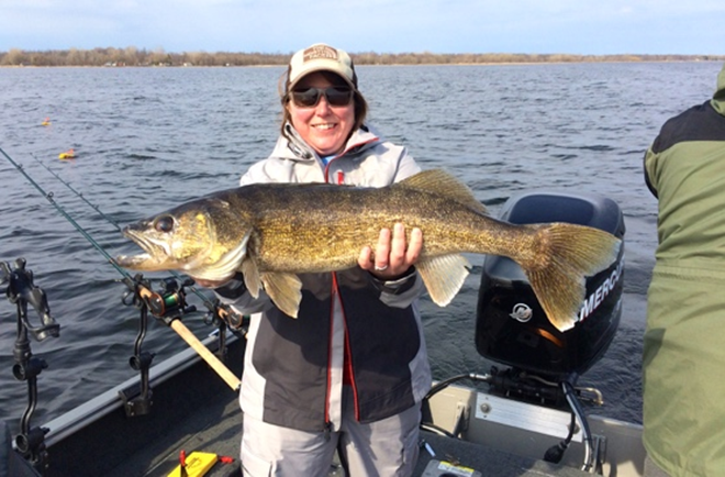 Female angler with a Green Bay walleye