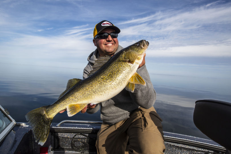 Tony Roach with a shallow water June walleye