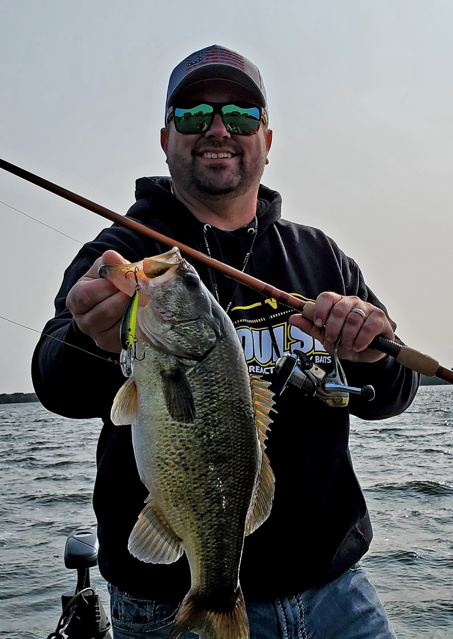 Angler with a big largemouth caught on A Rumble Series crankbait.