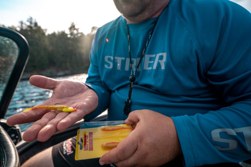 Fishermen holding the Northland Fishing Tackle Rippin' Minnow jig