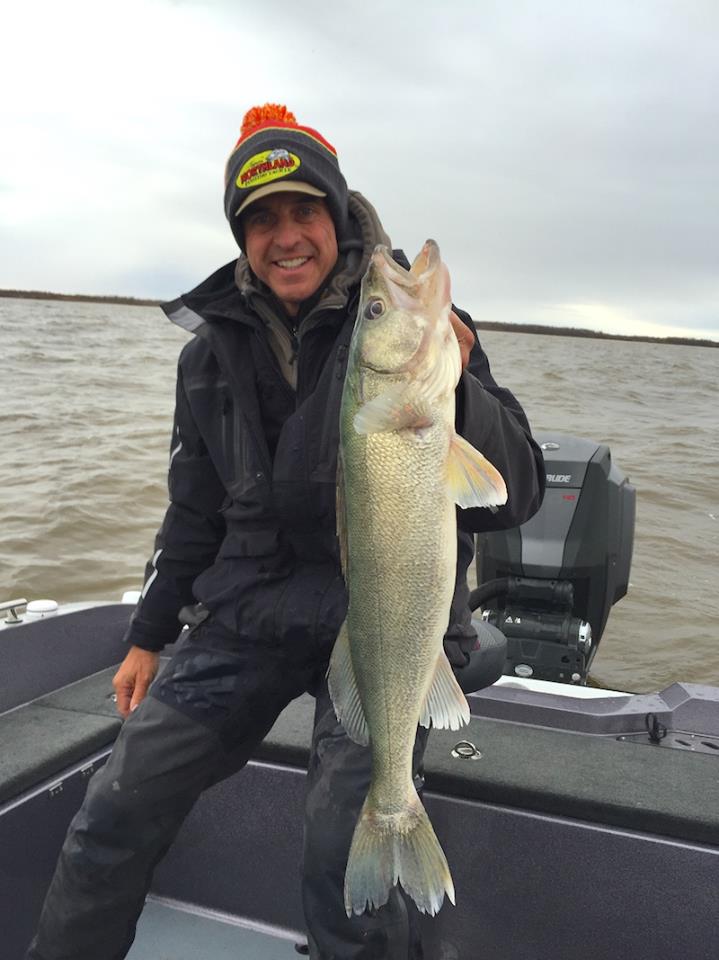 Cheep Leer with an early season river walleye.