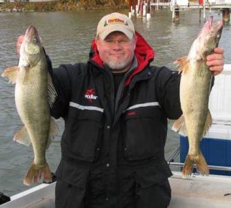 Angler with two walleyes