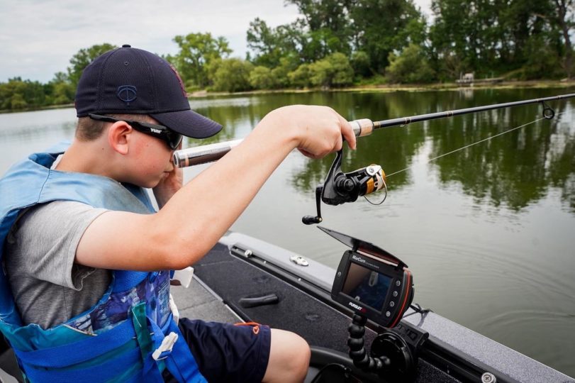 Young angler fishing