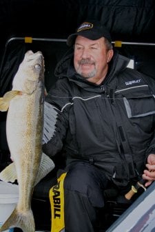Tom Neustrom ice fishing for walleye