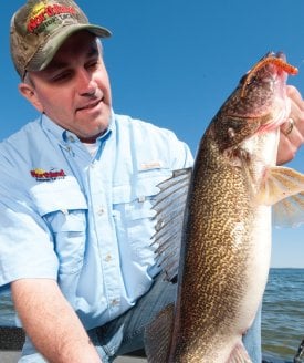 Craig Peterson with a walleye caught on a Paddle Minnow