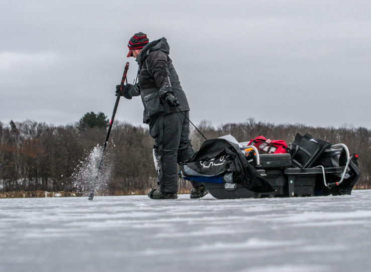 Ice fisherman on early ice