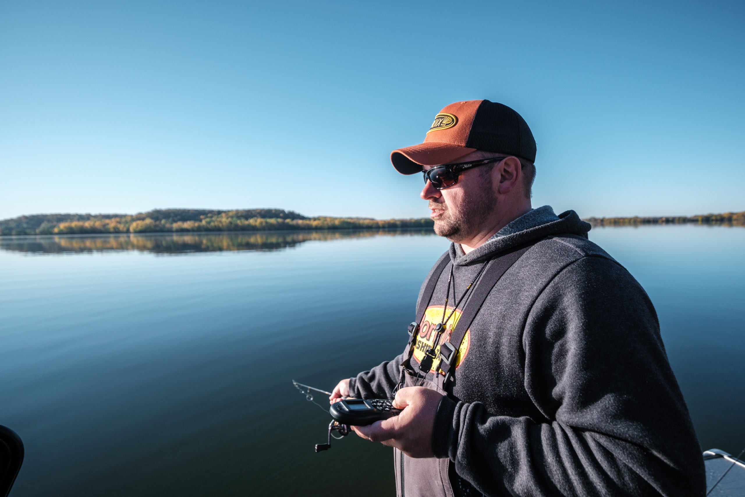 Fisherman dragging a jig when fall fishing