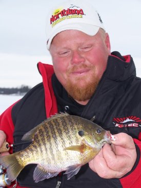 Brian 'Bro' Brosdahl with a bluegill caught on a Northland Bionic Bucktail Jig