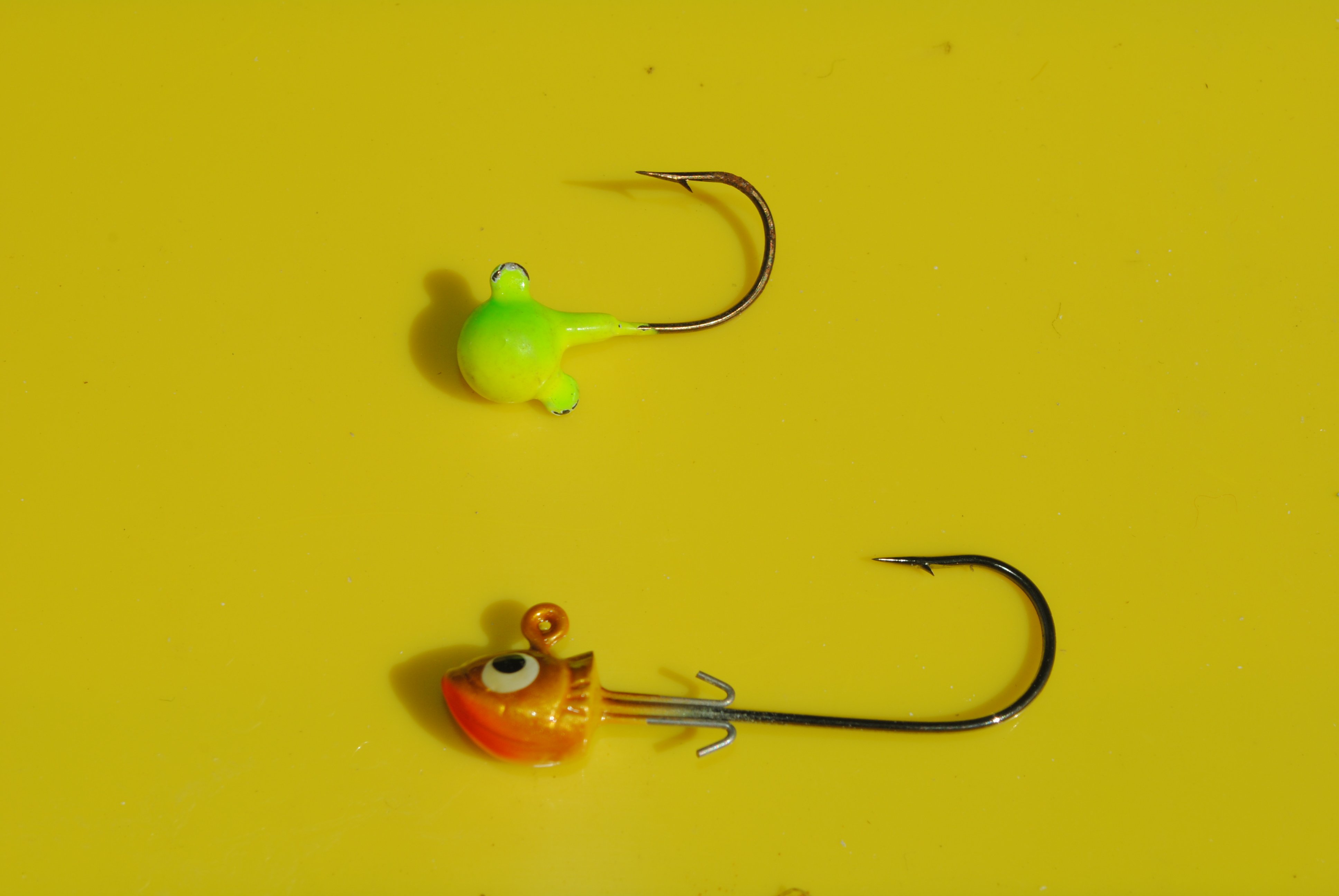 Northland Fishing Tackle Fire Ball and Stand Up Fire Ball Jig.