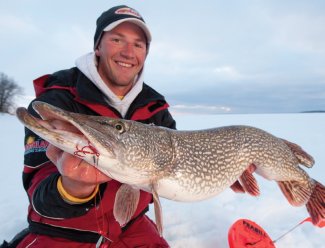 Gussy with a pike caught on a Predator Rig