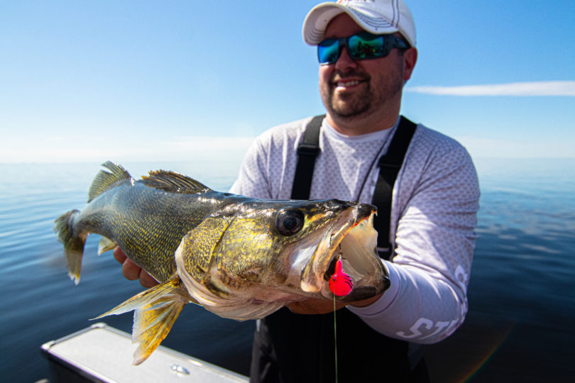 Joel Nelson with a walleye he caught vertical jigging 