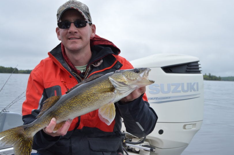 Angler with a deep water walleye