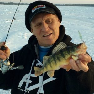 Mike Frisch with a Big Stone Lake perch that fell for a Buck-Shot Flutter Spoon
