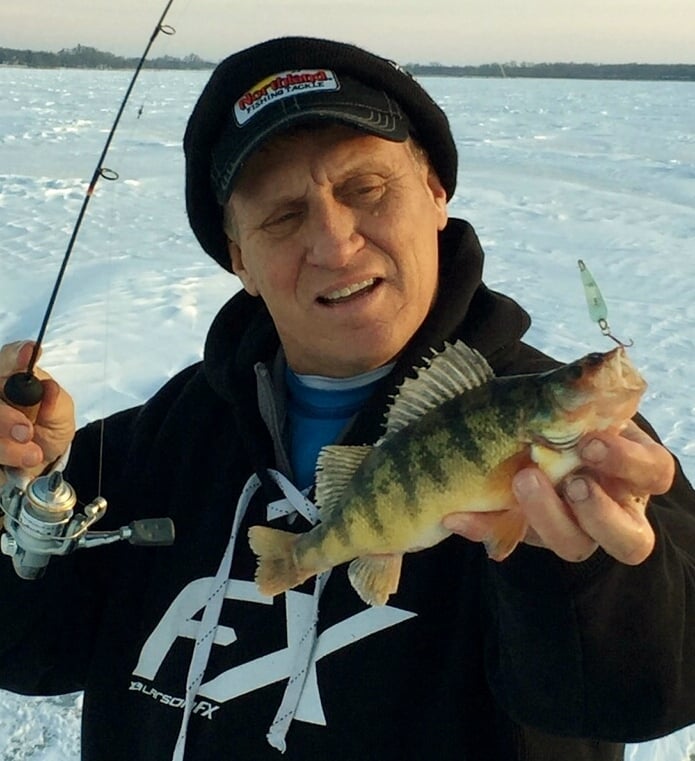 Mike Frisch with a Big Stone Lake yellow perch that fell for a Buck-Shot Flutter Spoon