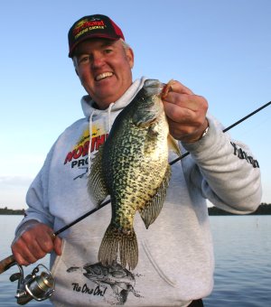 An early open water fishing crappie caught by a fisherman.