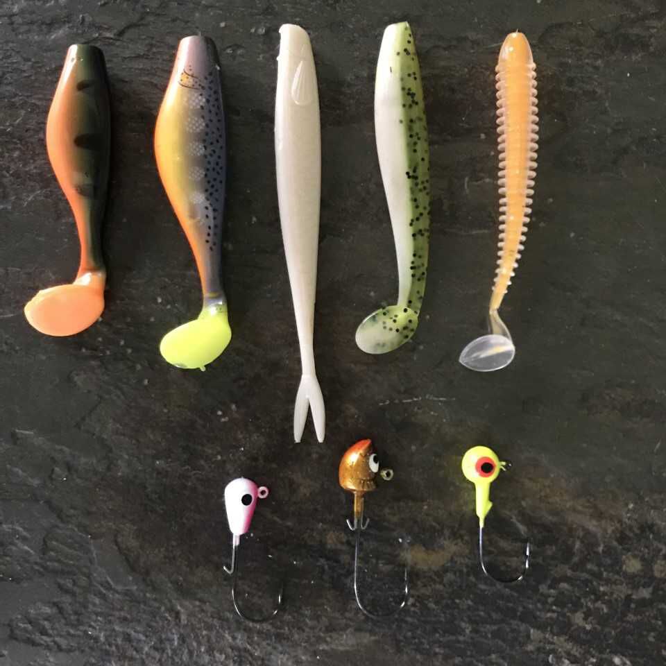 Soft plastic swimbaits and jig heads.