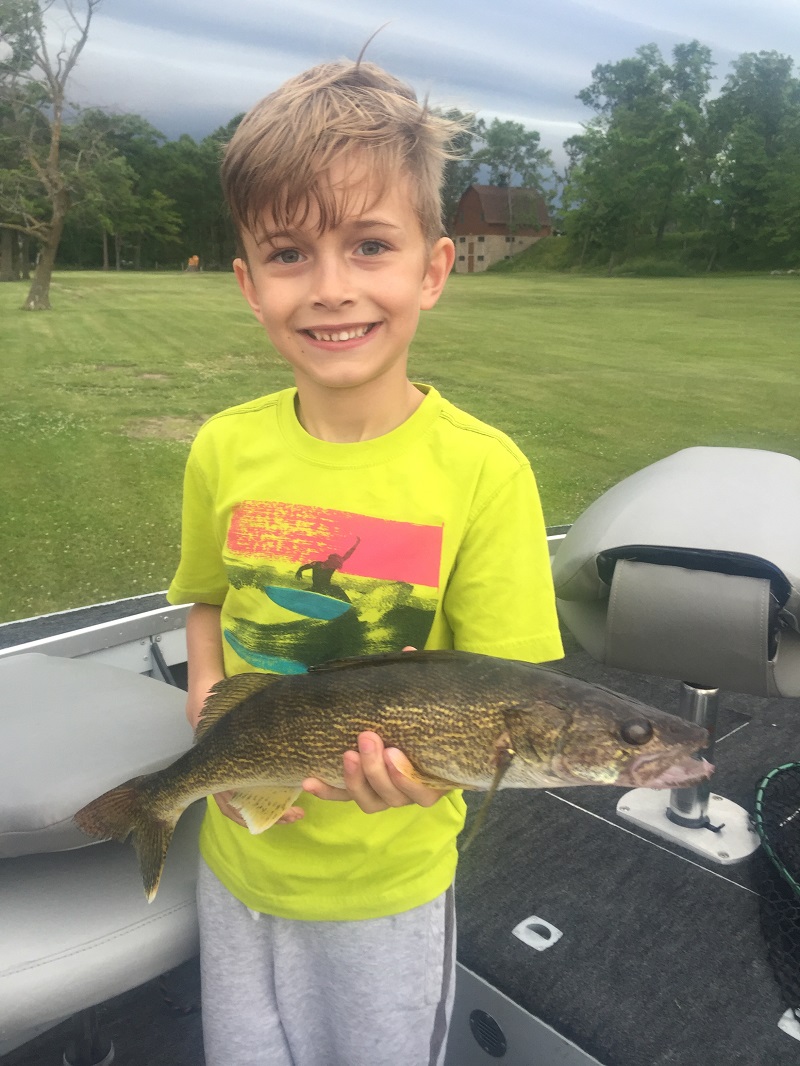 Young fisherman with a walleye