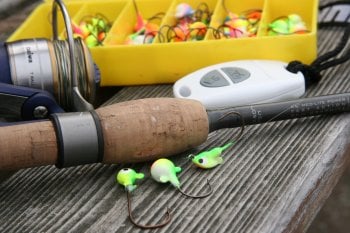 Northland Fishing Tackle jigs and a spinning rod/reel.