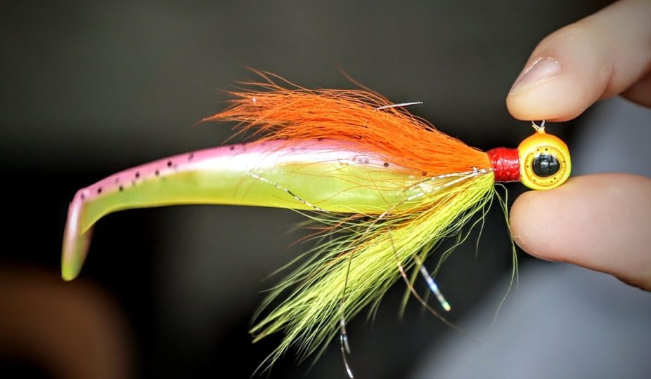 Deep-Vee Bucktail jig rigged with a soft plastic bait rigged on it