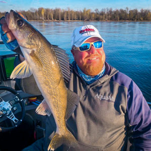 Fisherman holding walleye