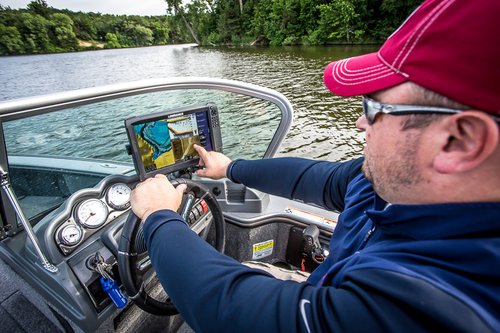 Reading the graph and deciphering side imagery for locating structure and fish.