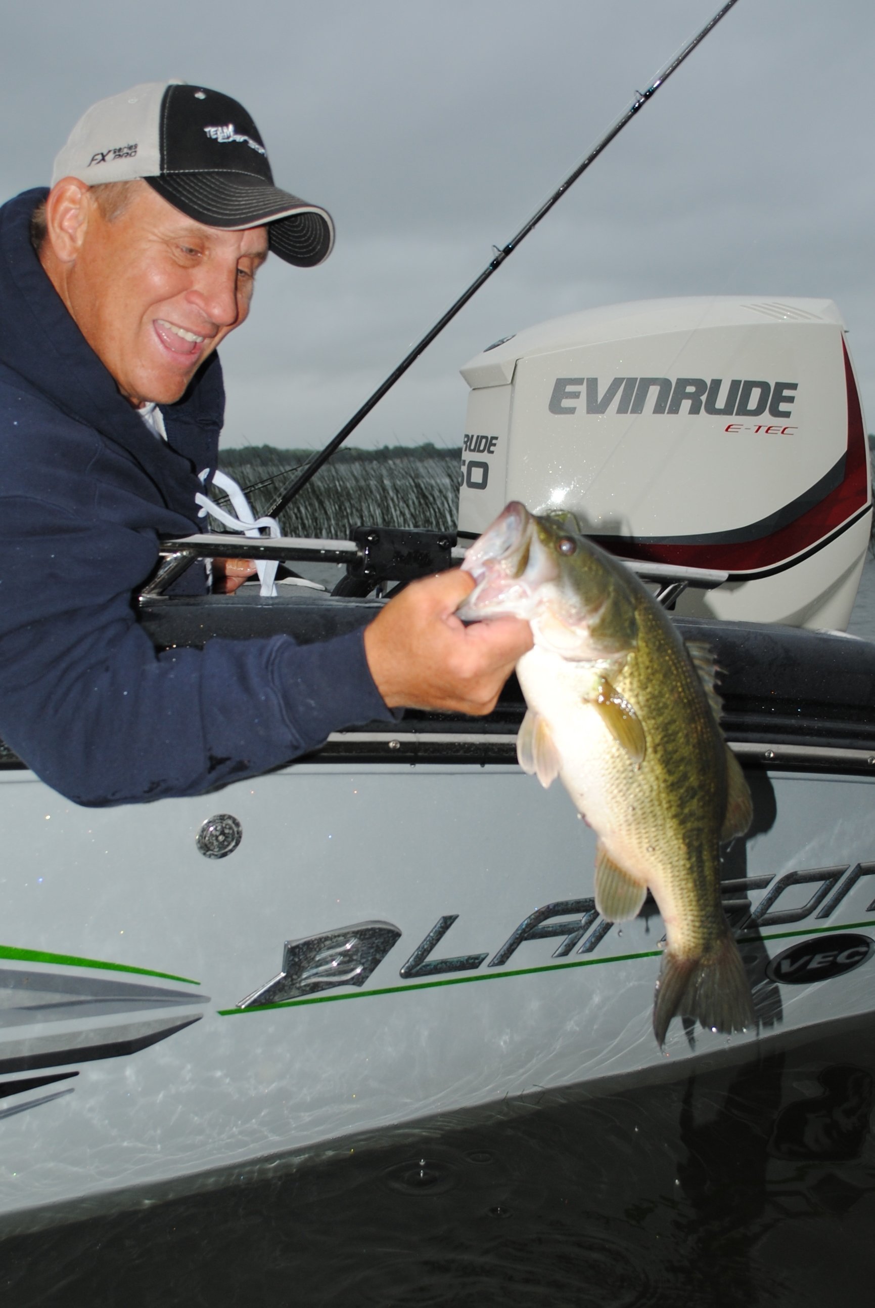 Mike Frisch with a largemouth he caught in the pencil reeds.