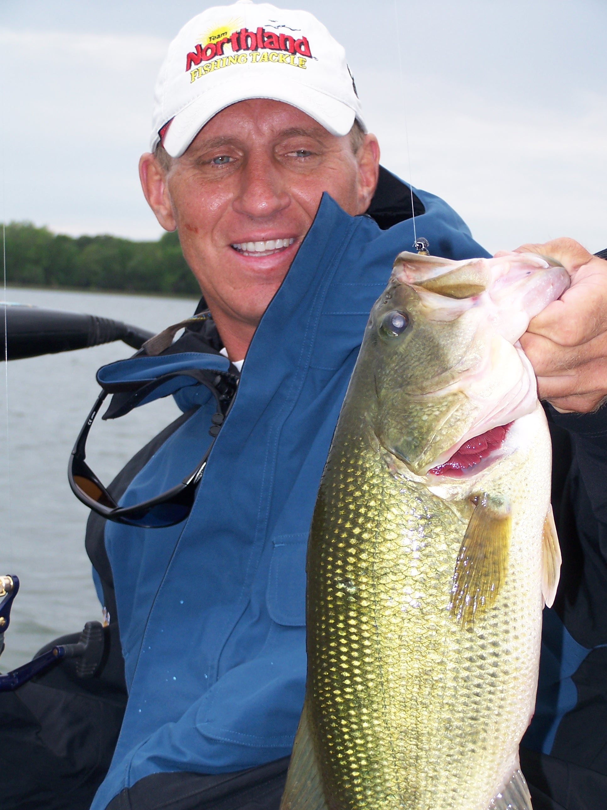 Mike Frisch caught this big bass on an overcast, drizzly summer day on a clear water lake. Remember, clear lakes on cloudy days, stained water lakes on bright days.