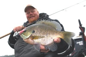 Brian 'Bro' Brosdahl with a bluegill he caught.