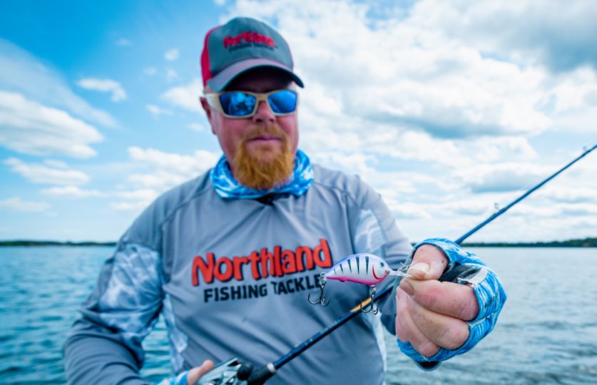 Fisherman holding up the Rumble Bug crankbait