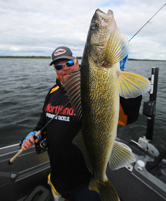 Brian Brosdahl holding walleye fish